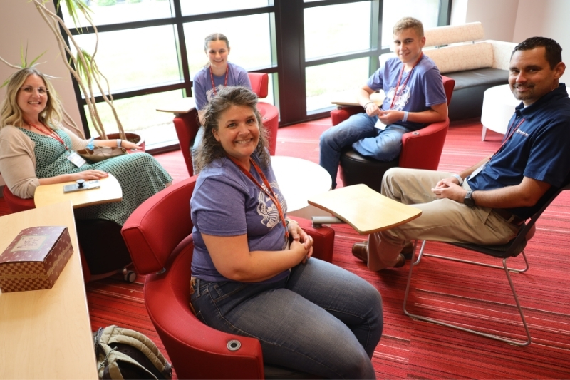 Amber with a group of volunteers at the Homeschool Iowa Conference: Supporting Your Homeschool Journey