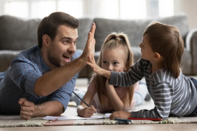Christian father fulfilling his role homeschooling children