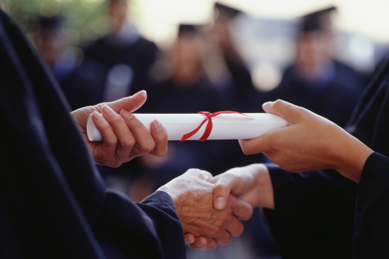 Student receiving a high school diploma
