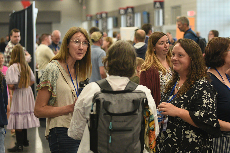 Conference 2026 Attendees Chat in Lobby